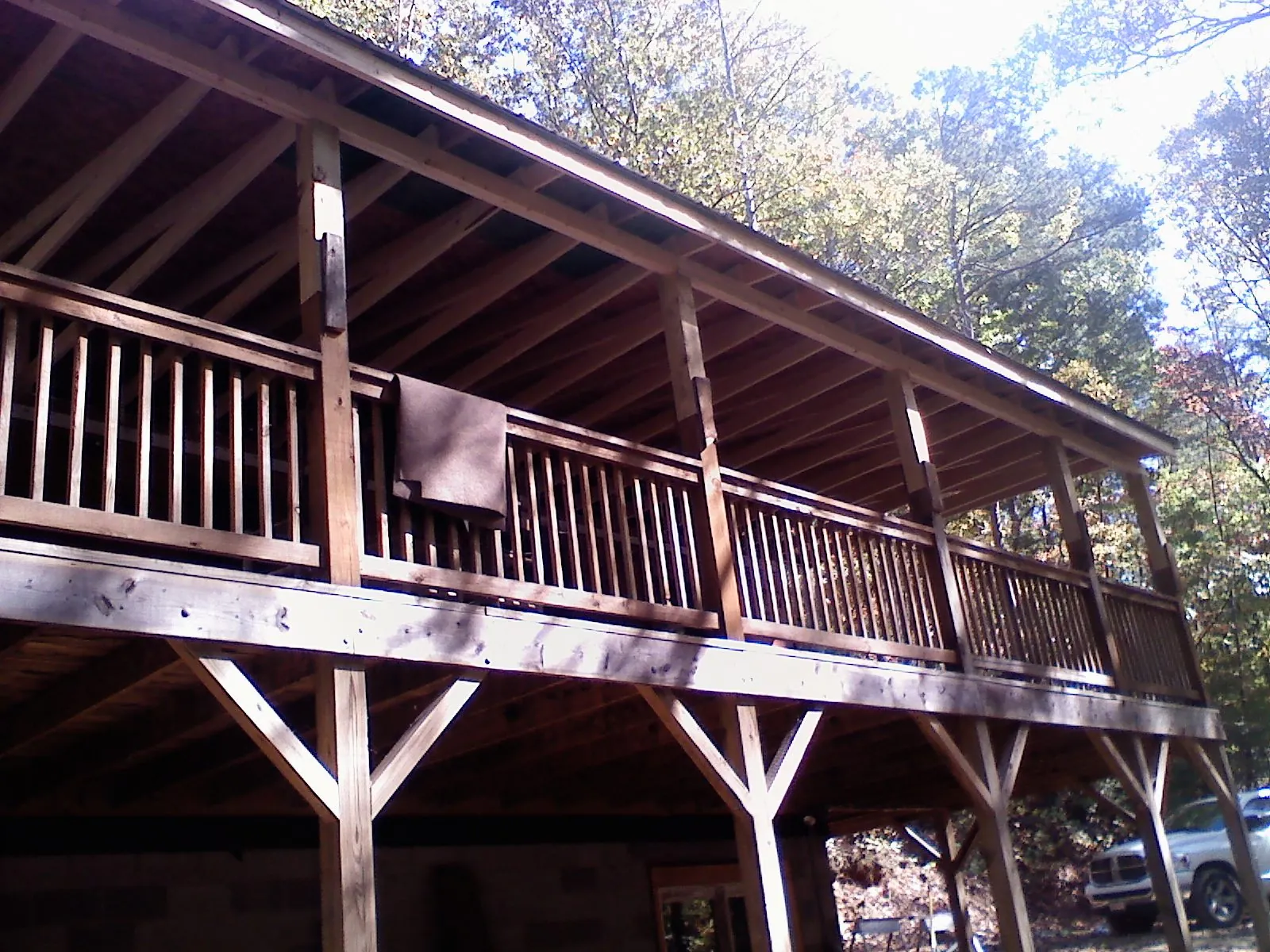 Timber framing under a new elevated porch and deck — Roof Leak Repair in Elmira by Roofing Brothers